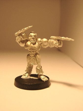 Ral Partha Tribal Orc Berserker striking