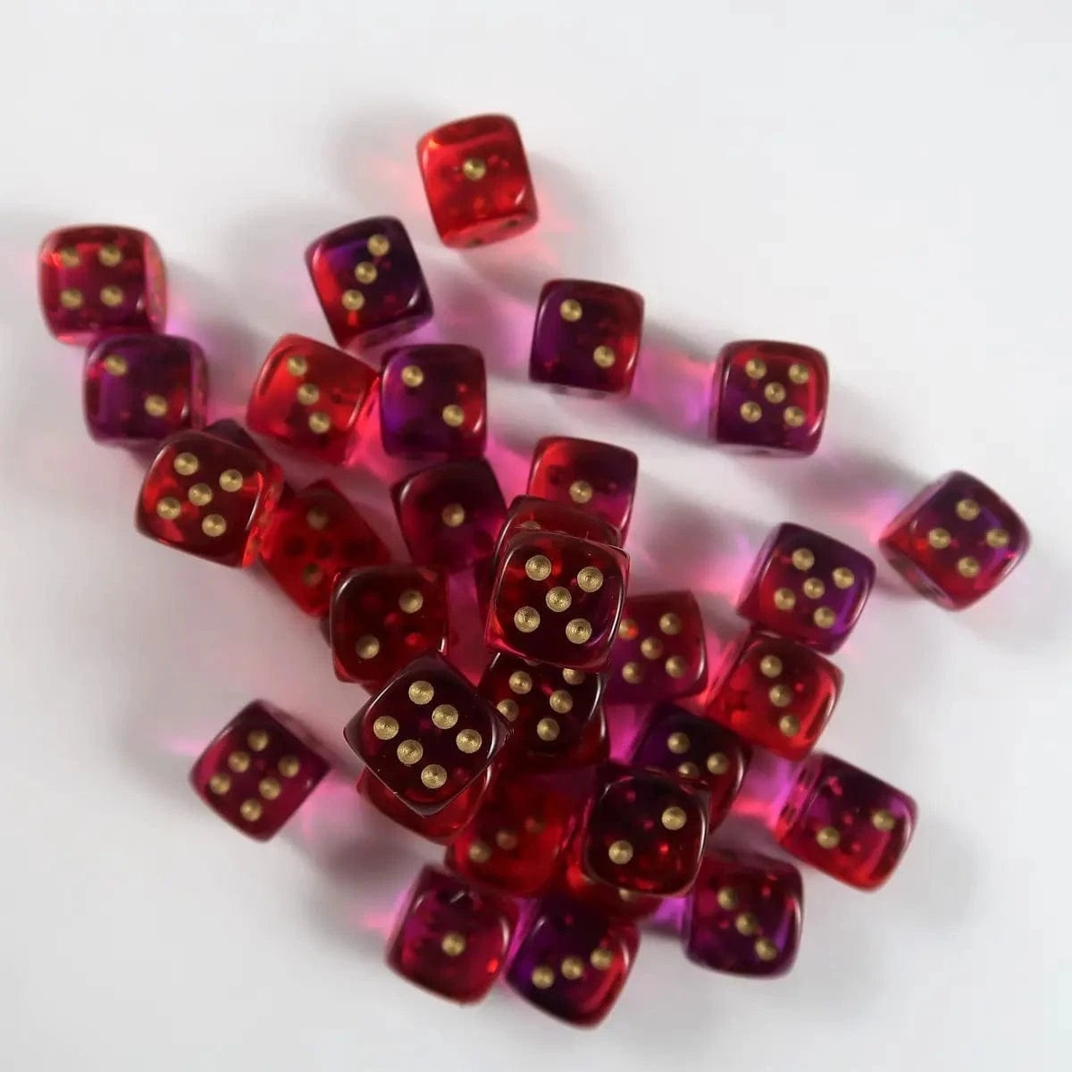 Chessex Chessex Gemini translucent red-violet/gold 12mm Set